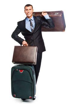 Young successful businessman in a business suit with three suitcases and a journey