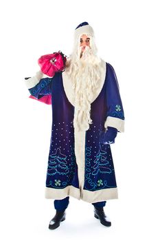 Santa Claus in a blue coat with a bag of gifts in red