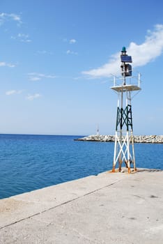 Seascape with seawall and port entrance