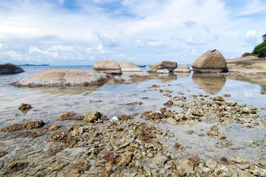 Thai island of Koh Samui. The pile of rocks on the beach