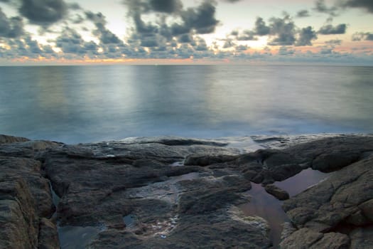 eascape. Sea and rock at the sunset