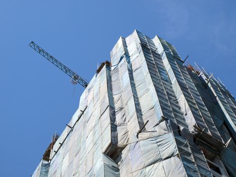 building construction site against blue sky