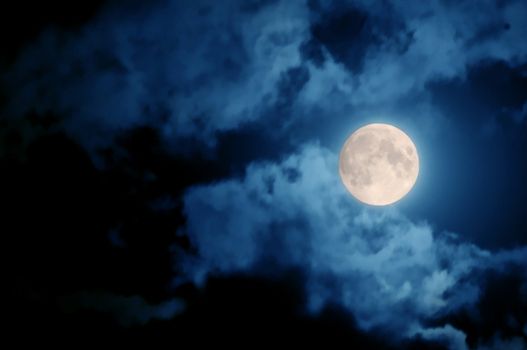 full moon over dark sky with.