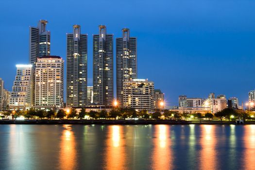 Bangkok city downtown at night with reflection of skyline, Bangkok,Thailand