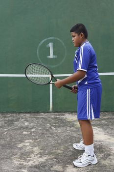 Thai boy tennis player learning how to preparing to play tennis
