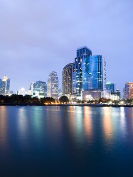 Bangkok city downtown at night with reflection of skyline, Bangkok,Thailand