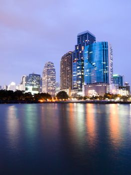 Bangkok city downtown at night with reflection of skyline, Bangkok,Thailand