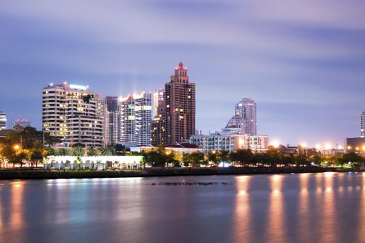 Bangkok city downtown at night with reflection of skyline, Bangkok,Thailand