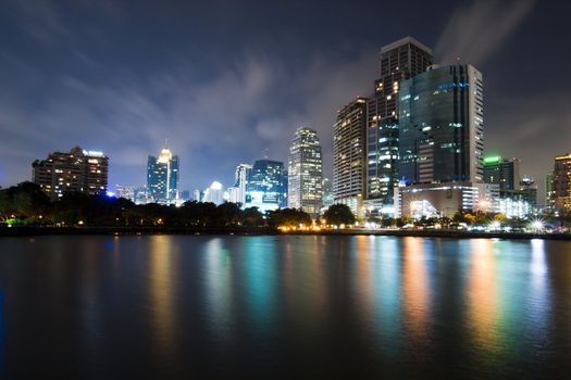 Bangkok city downtown at night with reflection of skyline, Bangkok,Thailand