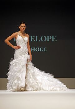 ZAGREB, CROATIA - FEBRUARY 19: Fashion model walks the runway in wedding dress on 'Wedding days' show, February 19, 2012 in Zagreb, Croatia.