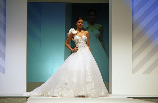 ZAGREB, CROATIA - FEBRUARY 19: Fashion model walks the runway in wedding dress on 'Wedding days' show, February 19, 2012 in Zagreb, Croatia.