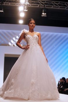 ZAGREB, CROATIA - FEBRUARY 19: Fashion model walks the runway in wedding dress on 'Wedding days' show, February 19, 2012 in Zagreb, Croatia.