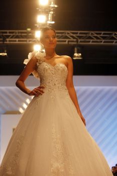 ZAGREB, CROATIA - FEBRUARY 19: Fashion model walks the runway in wedding dress on 'Wedding days' show, February 19, 2012 in Zagreb, Croatia.