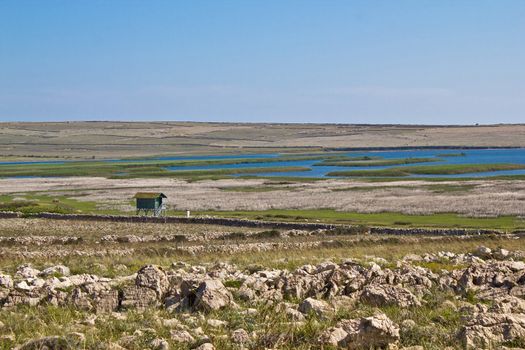 Ornithological reserve on Pag island with watching tower, Croatia, Dalmatia