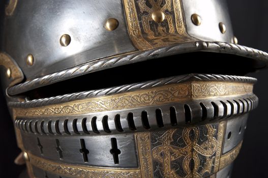 Iron helmet of the medieval knight. Very heavy headdress.