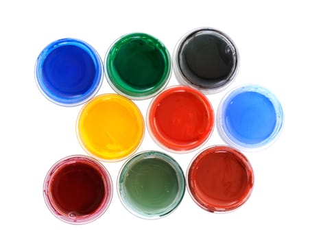 Many cans with different paints on white background