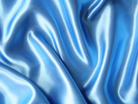 Smooth elegant dark blue silk can use as background 