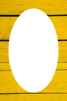 Isolated oval place for text photograph image on wall made of wooden yellow planks. Interesting background.