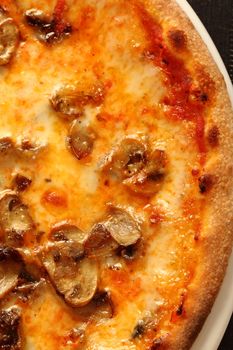 Close up of italian pizza margherita and mashrooms