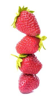 A row of fresh strawberry isolated on white