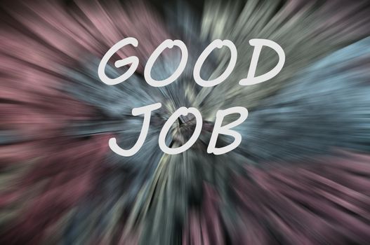 Good job written on a blurred background with colorful motion rays