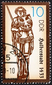 GDR - CIRCA 1989: a stamp printed in GDR shows Statue of Roland, Medieval Hero, Halberstadt, 1445, circa 1989