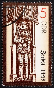 GDR - CIRCA 1989: a stamp printed in GDR shows Statue of Roland, Medieval Hero, Zerbst, 1445, circa 1989