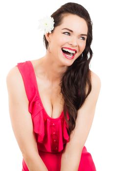 A beautiful sexy young woman in a red dress laughing