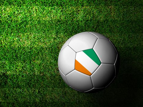 Ivory Coast Flag Pattern 3d rendering of a soccer ball in green grass
