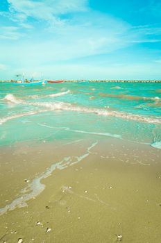 Blue boat on sea with blue sky