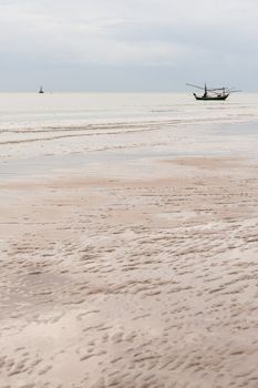 fishing boat thai on the sea with beach and softwave
