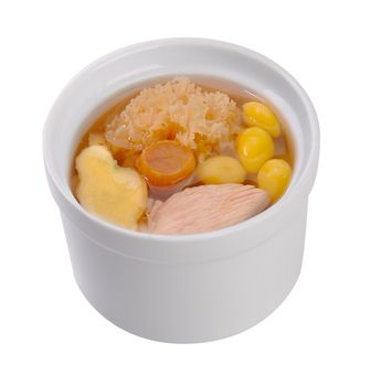 Chicken and herb soup in pot, Chinese food style.