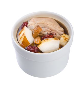 Chicken and herb soup in pot, Chinese food style.