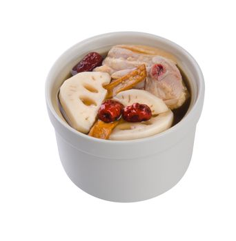 Chicken and herb soup in pot, Chinese food style.
