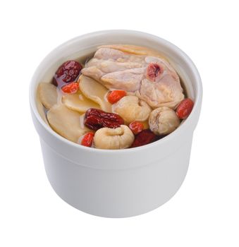 Chicken and herb soup in pot, Chinese food style.