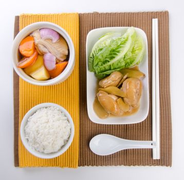 Chicken and herb soup in pot, Chinese food style.