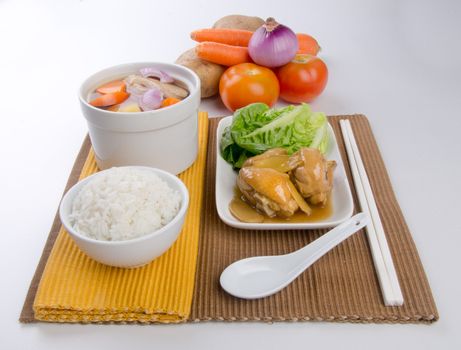 Chicken and herb soup in pot, Chinese food style.