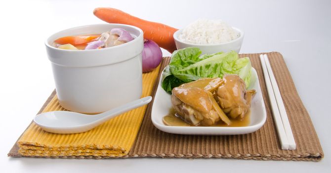 Chicken and herb soup in pot, Chinese food style.