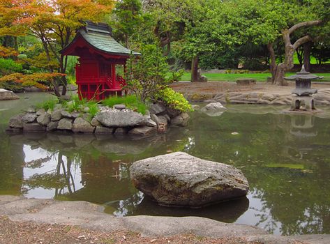 A photograph of an Asian style garden located at a public park.