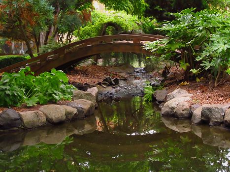 A photograph of an Asian style garden located at a public park.