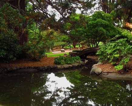 A photograph of an Asian style garden located at a public park.