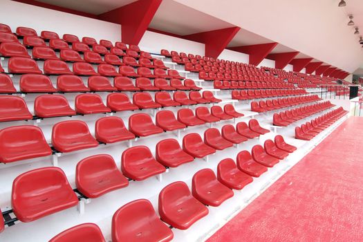 Red seat at Thep Hasadin Stadium in Thailand