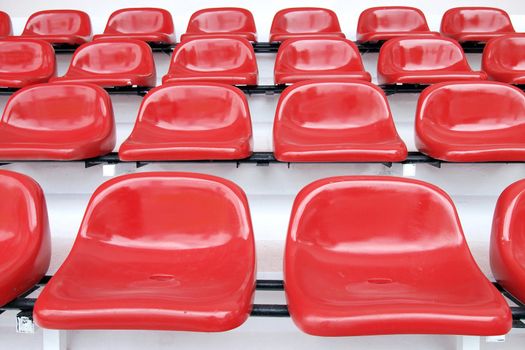 Red seat at Thep Hasadin Stadium in Thailand