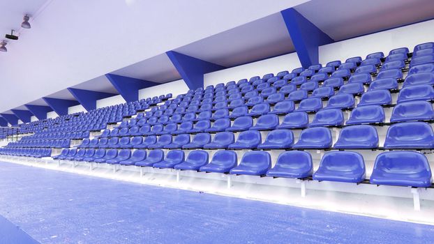 Blue seat at Thep Hasadin Stadium in Thailand