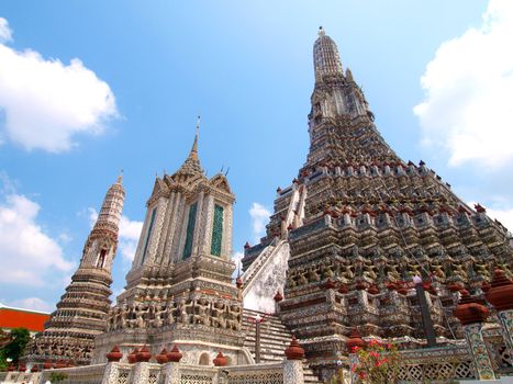 The Temple of Dawn Wat Arun and a beautiful blue sky in Bangkok, Thailand