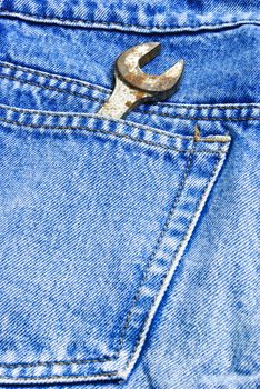 This is wrench in pocket of fabric jeans
