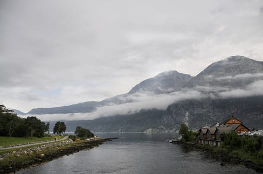 fog above the lake  of the quiet Norwegian bay