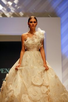 ZAGREB, CROATIA - FEBRUARY 19: Fashion model walks the runway in wedding dress on 'Wedding days' show, February 19, 2012 in Zagreb, Croatia.