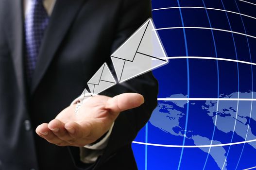 Businessman send email to customer around the world