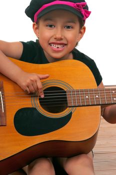 Child playing guitar and singing